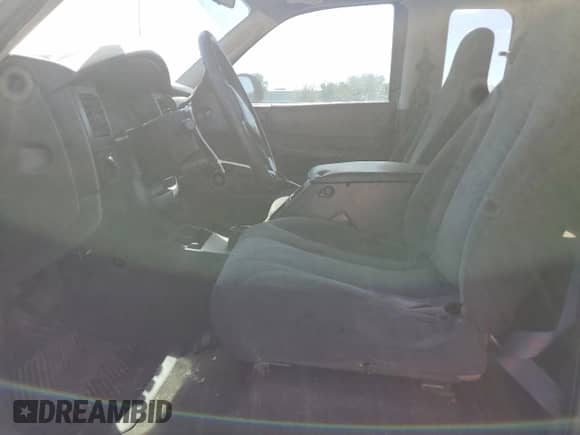 2004 Dodge Dakota z VIN 1D7GL12K64S603027, wystawiony jako Copart lot #75915894 z przebiegiem Nie podano mil oraz Czysty tytuł • Clean title. Historia ofert i sprzedaży dostępna na DreamBid. Obrazek 7.