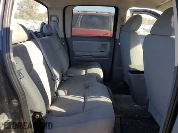 2007 Dodge Dakota ST z VIN 1D7HE28K27S255940, wystawiony jako Copart lot #76308744 z przebiegiem 101 304 mil mil oraz Szkoda całkowita • Salvage title. Historia ofert i sprzedaży dostępna na DreamBid. Obrazek 10.