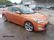 2012 Hyundai Veloster w/Red Int with VIN KMHTC6AD1CU022400, listed as a IAAI auction lot 43233734 with 203,900 mi miles and . Bid and sale history available at DreamBid. Image 1.