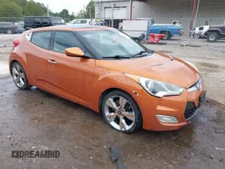 ✅ 2012 Hyundai Veloster w/Red Int • VIN: KMHTC6AD1CU022400 • Lot: 43233734. Wystawiony na IAAI z przebiegiem 203 900 mil. Bezpłatny archiwum sprzedaży aukcyjnych z USA i szczegółowy raport historii pojazdu na DreamBid. Zdjęcie 1.