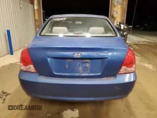 2005 Hyundai Elantra GLS z VIN KMHDN46D05U186414, wystawiony jako Copart lot #82921324 z przebiegiem 141 258 mil mil oraz Szkoda całkowita • Salvage title. Historia ofert i sprzedaży dostępna na DreamBid. Obrazek 6.