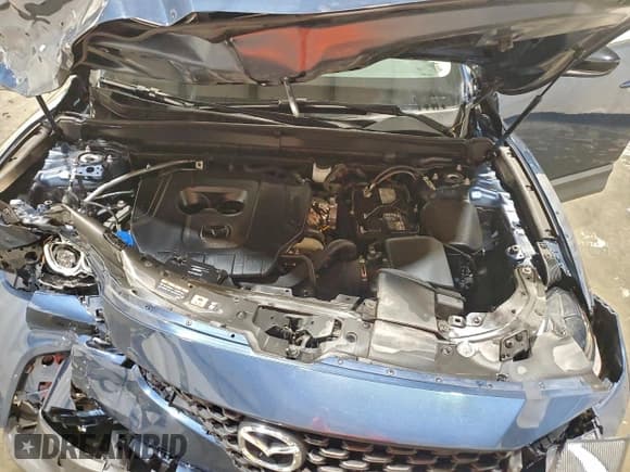 ✅ 2025 Mazda CX-50 S Preferred • VIN: 7MMVABBMXSN322682 • Lot: 96213705. Listed on Copart with 30,287 mi. Free auction sales archive from the USA and detailed vehicle history report at DreamBid. Image 12.