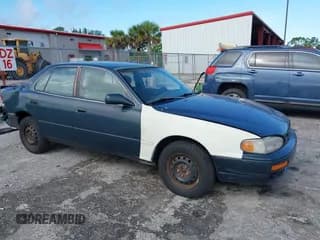 ✅ 1996 Toyota Camry DX • VIN: 4T1BG12K5TU916321 • Лот: 42954409. Опубликован ранее на IAAI с пробегом 259 185 миль. Бесплатный доступ к архиву аукционных продаж из США и подробный отчёт об истории автомобиля на DreamBid. Изображение 1.