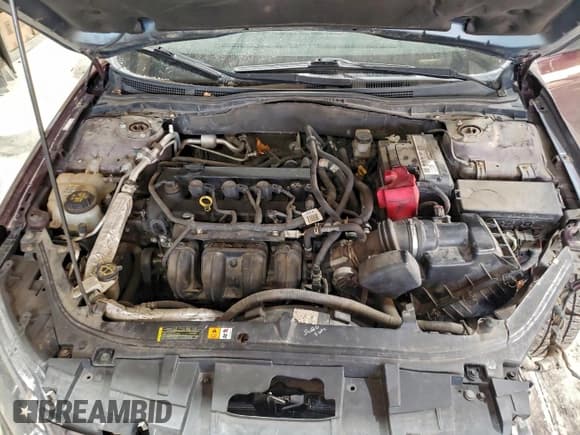 ✅ 2011 Ford Fusion S • VIN: 3FAHP0GAXBR260203 • Лот: 93601985. Опубликован ранее на Copart с пробегом 215 661 миль. Бесплатный доступ к архиву аукционных продаж из США и подробный отчёт об истории автомобиля на DreamBid. Изображение 11.