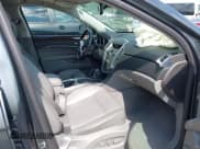 ✅ 2012 Cadillac SRX Luxury Collection • VIN: 3GYFNAE35CS641592 • Lot: 42382400. Wystawiony na IAAI z przebiegiem 150 559 mil. Bezpłatny archiwum sprzedaży aukcyjnych z USA i szczegółowy raport historii pojazdu na DreamBid. Zdjęcie 5.