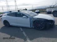 ✅ 2015 Tesla Model S 85D • VIN: 5YJSA1H4XFF081215 • Лот: 41657473. Опубликован ранее на IAAI с пробегом 143 847 миль. Бесплатный доступ к архиву аукционных продаж из США и подробный отчёт об истории автомобиля на DreamBid. Изображение 14.