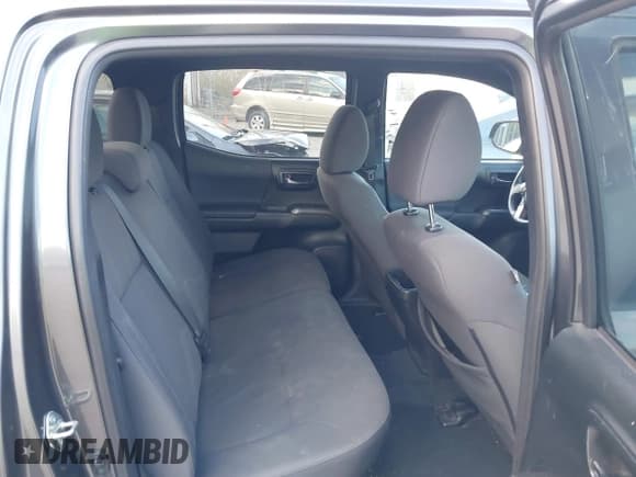 ✅ 2017 Toyota Tacoma TRD Off Road • VIN: 3TMCZ5ANXHM047622 • Lot: 43675723. Listed on IAAI with 124,168 mi. Free auction sales archive from the USA and detailed vehicle history report at DreamBid. Image 8.