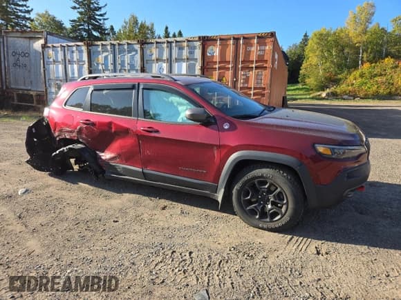 ✅ 2020 Jeep Cherokee Trailhawk • VIN: 1C4PJMBX0LD656645 • Lot: 80246405. Listed on Copart with 16,808 mi. Free auction sales archive from the USA and detailed vehicle history report at DreamBid. Image 4.