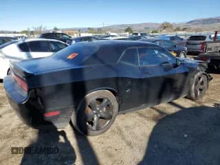 ✅ 2014 Dodge Challenger R/T Classic • VIN: 2C3CDYBTXEH299592 • Lot: 87731455. Wystawiony na Copart z przebiegiem 120 779 mil. Bezpłatny archiwum sprzedaży aukcyjnych z USA i szczegółowy raport historii pojazdu na DreamBid. Zdjęcie 3.