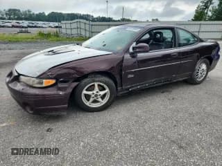 ✅ 2002 Pontiac Grand Prix GT • VIN: 1G2WP12K62F267108 • Lot: 64470845. Listed on Copart with 112,997 mi. Free auction sales archive from the USA and detailed vehicle history report at DreamBid. Image 1.