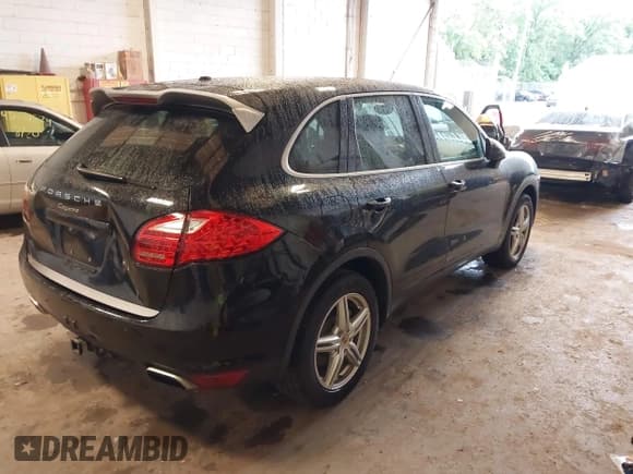 ✅ 2014 Porsche Cayenne • VIN: WP1AA2A24ELA07728 • Lot: 43034718. Listed on IAAI with 127,258 mi. Free auction sales archive from the USA and detailed vehicle history report at DreamBid. Image 4.