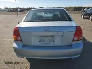 2003 Hyundai Accent GL с VIN KMHCG45C23U428132, выставлен на аукционе Copart как лот 45493875 с пробегом Не указан миль и Списание • Salvage title. История ставок и продаж доступна на DreamBid. Изображение 6.