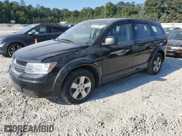 ✅ 2013 Dodge Journey SE • VIN: 3C4PDCAB1DT721733 • Lot: 69377584. Listed on Copart with 130,587 mi. Free auction sales archive from the USA and detailed vehicle history report at DreamBid. Image 1.