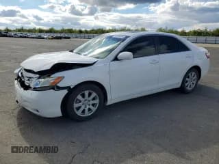 ✅ 2007 Toyota Camry XLE • VIN: JTNBE46K473113755 • Lot: 82539435. Listed on Copart with 307,042 mi. Free auction sales archive from the USA and detailed vehicle history report at DreamBid. Image 1.