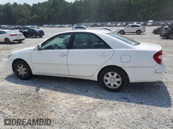 ✅ 2002 Toyota Camry LE • VIN: 4T1BE32K82U579207 • Lot: 59644845. Listed on Copart with 236,005 mi. Free auction sales archive from the USA and detailed vehicle history report at DreamBid. Image 2.
