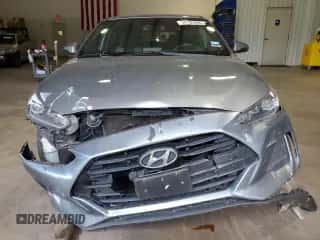 2019 Hyundai Veloster 2.0 с VIN KMHTG6AF3KU018563, выставлен на аукционе Copart как лот 74105094 с пробегом 75 578 миль миль и Списание • Salvage title. История ставок и продаж доступна на DreamBid. Изображение 5.