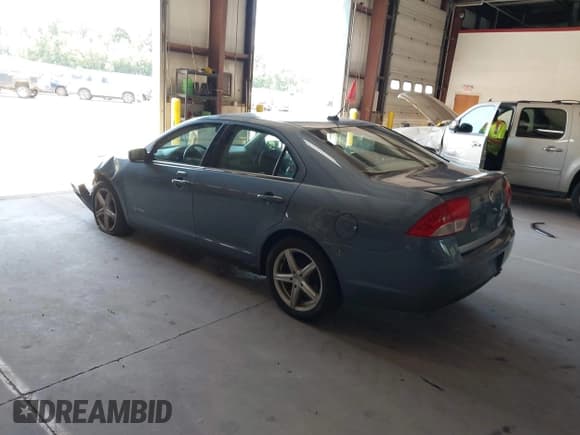 ✅ 2011 Mercury Milan Hybrid • VIN: 3MEDM0L33BR601934 • Lot: 42573108. Listed on IAAI with 161,278 mi. Free auction sales archive from the USA and detailed vehicle history report at DreamBid. Image 3.