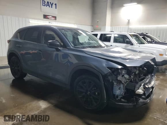 ✅ 2023 Mazda CX-5 S Carbon Edition • VIN: JM3KFBCM2P0122815 • Lot: 92451015. Wystawiony na Copart z przebiegiem 78 565 mil. Bezpłatny archiwum sprzedaży aukcyjnych z USA i szczegółowy raport historii pojazdu na DreamBid. Zdjęcie 4.
