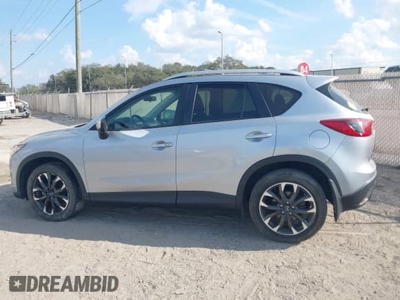 ✅ 2016 Mazda CX-5 Grand Touring • VIN: JM3KE4DY0G0856658 • Lot: 43778076. Wystawiony na IAAI z przebiegiem 103 388 mil. Bezpłatny archiwum sprzedaży aukcyjnych z USA i szczegółowy raport historii pojazdu na DreamBid. Zdjęcie 14.