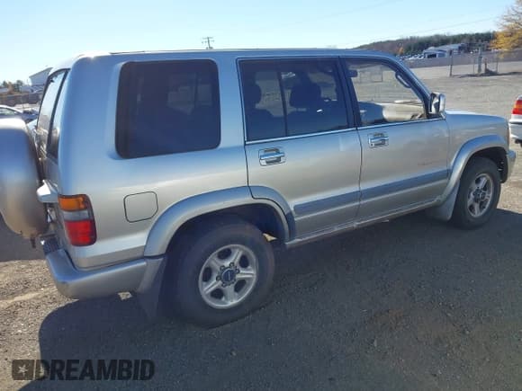 ✅ 1999 Isuzu Trooper S • VIN: JACDJ58X0X7927321 • Lot: 43713393. Listed on IAAI with 293,015 mi. Free auction sales archive from the USA and detailed vehicle history report at DreamBid. Image 4.