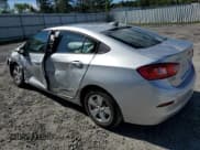 ✅ 2018 Chevrolet Cruze LS • VIN: 1G1BC5SM1J7205440 • Lot: 66359193. Listed on Copart with 15,435 mi. Free auction sales archive from the USA and detailed vehicle history report at DreamBid. Image 2.