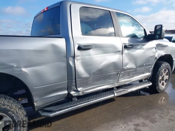 ✅ 2023 Ram 2500 Big Horn • VIN: 3C6UR5DJ5PG539184 • Lot: 43265378. Listed on IAAI with 76,820 mi. Free auction sales archive from the USA and detailed vehicle history report at DreamBid. Image 17.