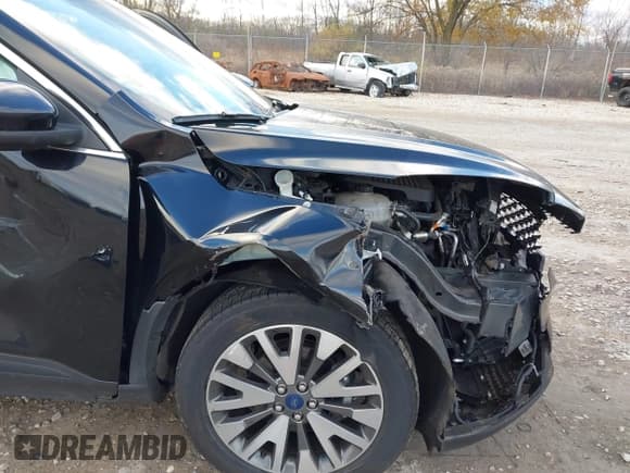 ✅ 2020 Ford Escape Titanium • VIN: 1FMCU9J9XLUB30993 • Lot: 43653347. Listed on IAAI with 88,349 mi. Free auction sales archive from the USA and detailed vehicle history report at DreamBid. Image 6.