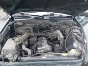 ✅ 1999 Toyota Tacoma • VIN: 4TAVL52N6XZ530719 • Lot: 43753647. Listed on IAAI with 240,331 mi. Free auction sales archive from the USA and detailed vehicle history report at DreamBid. Image 10.