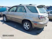 ✅ 2001 Lexus RX 300 • VIN: JTJGF10U410086868 • Lot: 42761484. Listed on IAAI with 207,802 mi. Free auction sales archive from the USA and detailed vehicle history report at DreamBid. Image 3.