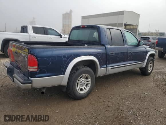 2004 Dodge Dakota SLT z VIN 1D7HL48K34S630621, wystawiony jako Copart lot #80789545 z przebiegiem 141 856 mil mil oraz Szkoda całkowita • Salvage title. Historia ofert i sprzedaży dostępna na DreamBid. Obrazek 3.