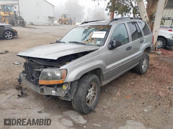 ✅ 2002 Jeep Grand Cherokee • VIN: 1J8GX48S42C147018 • Lot: 43589496. Listed on IAAI with 192,014 mi. Free auction sales archive from the USA and detailed vehicle history report at DreamBid. Image 2.
