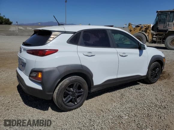 ✅ 2018 Hyundai Kona SE • VIN: KM8K12AA3JU091053 • Лот: 69489344. Опубликован ранее на Copart с пробегом 104 582 миль. Бесплатный доступ к архиву аукционных продаж из США и подробный отчёт об истории автомобиля на DreamBid. Изображение 3.