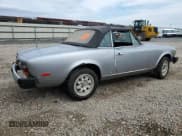 ✅ 1980 FIAT 124 Spider • VIN: 124CS000167543 • Lot: 53031904. Listed on Copart with 60,115 mi. Free auction sales archive from the USA and detailed vehicle history report at DreamBid. Image 3.