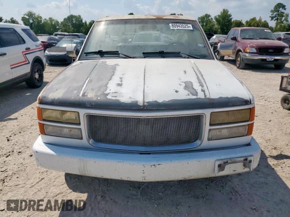 ✅ 1990 GMC Sierra 1500 • VIN: 1GTDC14Z1LZ545163 • Lot: 80943525. Wystawiony na Copart z przebiegiem 181 256 mil. Bezpłatny archiwum sprzedaży aukcyjnych z USA i szczegółowy raport historii pojazdu na DreamBid. Zdjęcie 5.