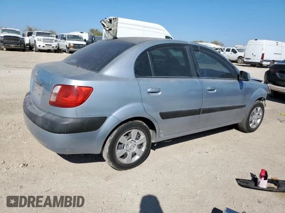 ✅ 2007 Kia Rio LX • VIN: KNADE123176277731 • Lot: 91933635. Listed on Copart with 116,940 mi. Free auction sales archive from the USA and detailed vehicle history report at DreamBid. Image 3.