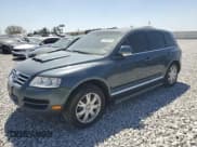 ✅ 2006 Volkswagen Touareg • VIN: WVGPT77LX6D056538 • Lot: 51330225. Listed on Copart with 183,060 mi. Free auction sales archive from the USA and detailed vehicle history report at DreamBid. Image 1.