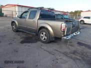 ✅ 2005 Nissan Frontier SE • VIN: 1N6AD07UX5C436648 • Lot: 41936612. Wystawiony na IAAI z przebiegiem 306 781 mil. Bezpłatny archiwum sprzedaży aukcyjnych z USA i szczegółowy raport historii pojazdu na DreamBid. Zdjęcie 3.