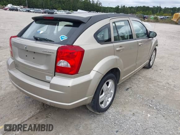 2009 Dodge Caliber SXT z VIN 1B3HB48A09D144835, wystawiony jako IAAI lot #41591982 z przebiegiem Nie podano mil oraz . Historia ofert i sprzedaży dostępna na DreamBid. Obrazek 4.