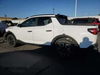 2022 Hyundai Santa Cruz SEL z VIN 5NTJC4AE4NH009499, wystawiony jako Copart lot #75622154 z przebiegiem 18 245 mil mil oraz Szkoda całkowita • Salvage title. Historia ofert i sprzedaży dostępna na DreamBid. Obrazek 2.