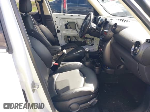 ✅ 2015 MINI Countryman S • VIN: WMWZC5C53FWT38126 • Lot: 43360139. Listed on IAAI with 125,559 mi. Free auction sales archive from the USA and detailed vehicle history report at DreamBid. Image 5.