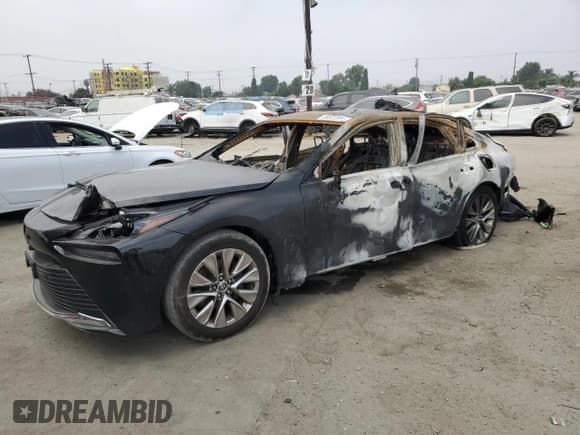 ✅ 2022 Toyota Mirai XLE • VIN: JTDAAAAA9NA007450 • Лот: 69522594. Опубликован ранее на Copart с пробегом Не указан. Бесплатный доступ к архиву аукционных продаж из США и подробный отчёт об истории автомобиля на DreamBid. Изображение 1.