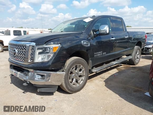 ✅ 2018 Nissan Titan S • VIN: 1N6AA1F40JN512862 • Lot: 43395643. Listed on IAAI with 166,504 mi. Free auction sales archive from the USA and detailed vehicle history report at DreamBid. Image 17.