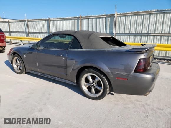 ✅ 2004 Ford Mustang GT Deluxe • VIN: 1FAFP45X24F122936 • Лот: 81607885. Опубликован ранее на Copart с пробегом 129 898 миль. Бесплатный доступ к архиву аукционных продаж из США и подробный отчёт об истории автомобиля на DreamBid. Изображение 2.