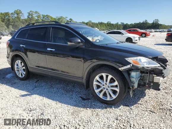 ✅ 2012 Mazda CX-9 Grand Touring • VIN: JM3TB2DA3C0335755 • Lot: 87068595. Wystawiony na Copart z przebiegiem 148 982 mil. Bezpłatny archiwum sprzedaży aukcyjnych z USA i szczegółowy raport historii pojazdu na DreamBid. Zdjęcie 4.