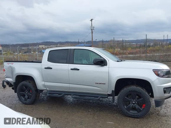 ✅ 2018 Chevrolet Colorado 4WD LT • VIN: 1GCGTCEN2J1252873 • Лот: 43782665. Опубликован ранее на IAAI с пробегом 52 415 миль. Бесплатный доступ к архиву аукционных продаж из США и подробный отчёт об истории автомобиля на DreamBid. Изображение 13.