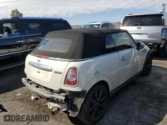 ✅ 2014 MINI Convertible • VIN: WMWZN3C59ET569823 • Лот: 72543194. Опубликован ранее на Copart с пробегом 56 730 миль. Бесплатный доступ к архиву аукционных продаж из США и подробный отчёт об истории автомобиля на DreamBid. Изображение 3.