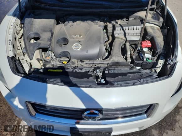 2013 Nissan Maxima SV с VIN 1N4AA5AP4DC820375, выставлен на аукционе Copart как лот 84957855 с пробегом 140 746 миль миль и Списание • Salvage title. История ставок и продаж доступна на DreamBid. Изображение 11.