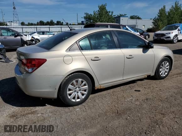 2011 Chevrolet Cruze LS+ 1SB с VIN 1G1PA5SH6B7259588, выставлен на аукционе Copart как лот 80150115 с пробегом 180 952 миль миль и Списание • Salvage title. История ставок и продаж доступна на DreamBid. Изображение 3.