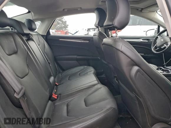 ✅ 2015 Ford Fusion Titanium Hybrid • VIN: 3FA6P0RU6FR179817 • Lot: 95251945. Wystawiony na Copart z przebiegiem 115 636 mil. Bezpłatny archiwum sprzedaży aukcyjnych z USA i szczegółowy raport historii pojazdu na DreamBid. Zdjęcie 10.