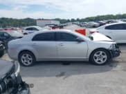 ✅ 2010 Chevrolet Malibu 1FL • VIN: 1G1ZA5E09AF278431 • Lot: 43355679. Listed on IAAI with 165,370 mi. Free auction sales archive from the USA and detailed vehicle history report at DreamBid. Image 13.